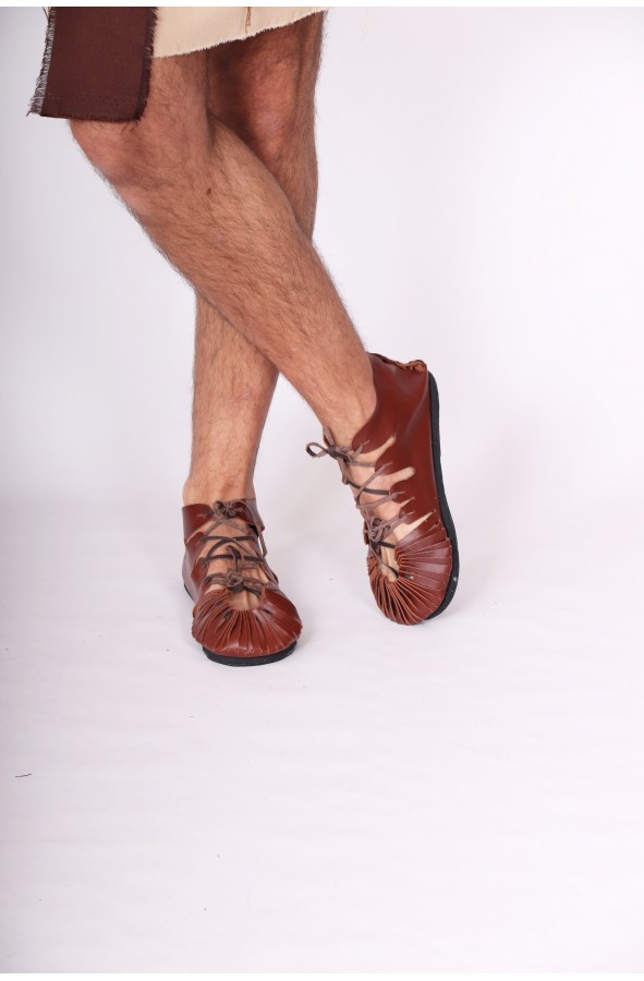Brown roman footwear
