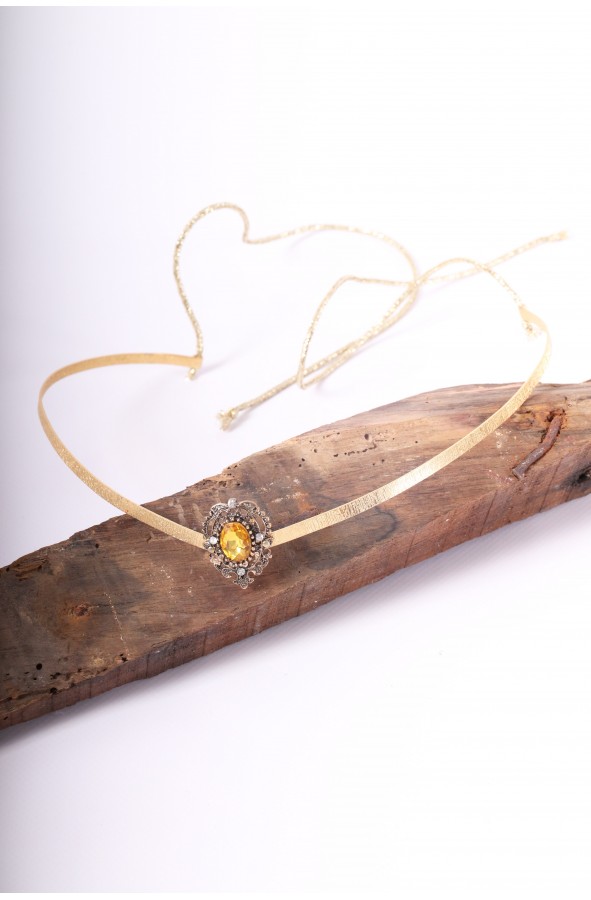 Golden crown or tiara with ambar...