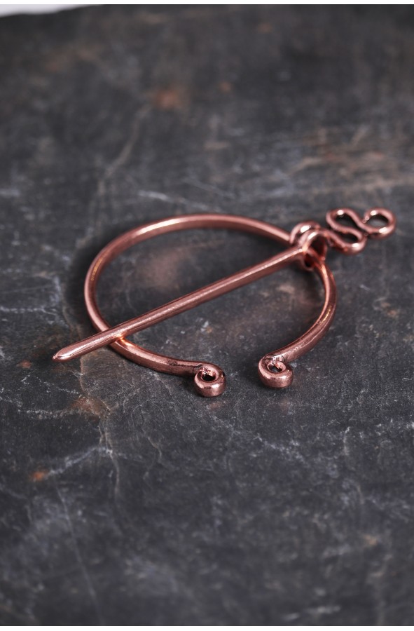 Celtic fibula or penanular copper brooch
