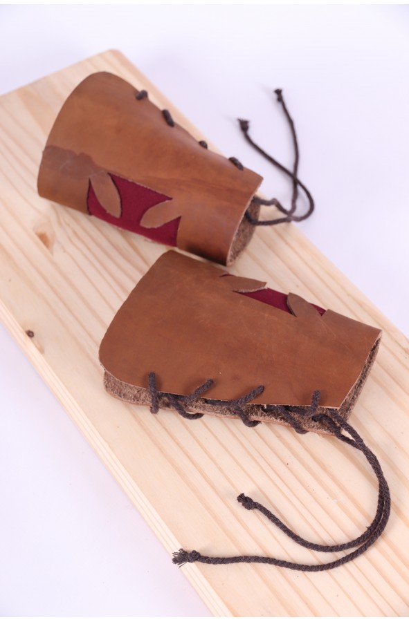 Medieval leather bracers with cross...