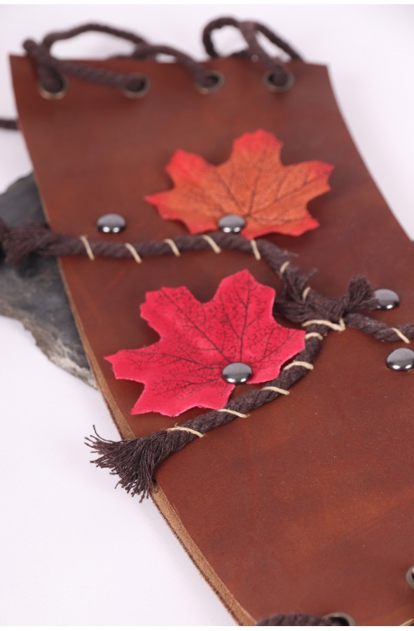 Medieval leather corset with leaves...