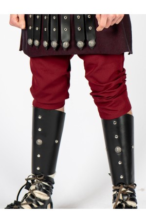 Black leather greaves with lions and studs